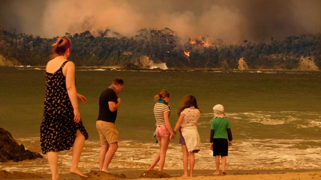 New Year’s Eve 2019: Bushfire arrives at the township of Malua Bay NSW, just south of Batemans Bay. Picture: Alex Coppel.