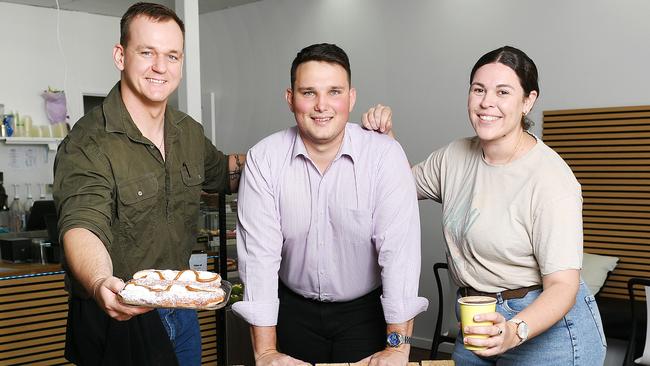 Joshua Cullinan, Colliers Leasing Executive Reagan Stokley, and Brooke Bell at their new cafe in Riverview Marketplace. Picture: Shae Beplate.