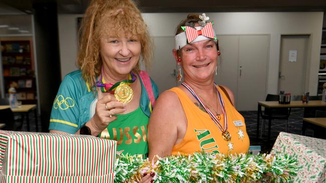 Olympic-themed Legacy Christmas function at the Townsville RSL. Lindy Hensen and Meri Shelley. Picture: Evan Morgan