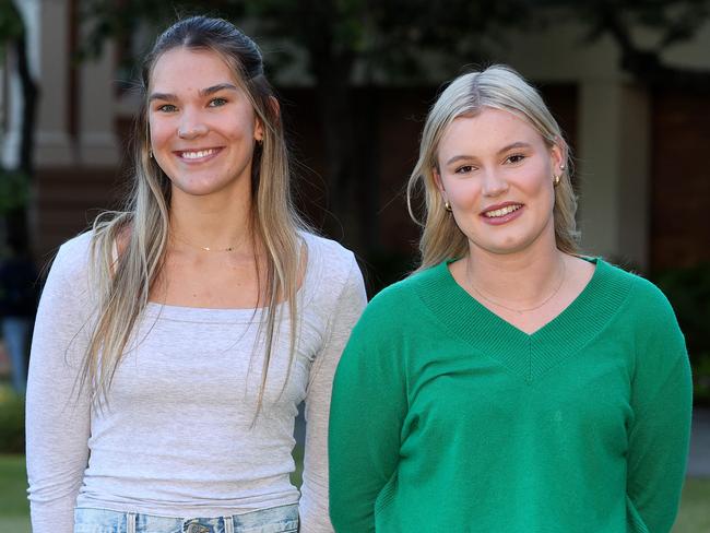 Body dissatisfaction has stopped nearly half of young people from going to school. The shock revelation comes from the Butterfly Foundation's annual youth survey. Pictured are Asha Enders and Georgie Pryor (green top) worked through body image issues while at school but are more confident in themselves since leaving High School Brisbane Thursday 23rd May 2024 Picture David Clark