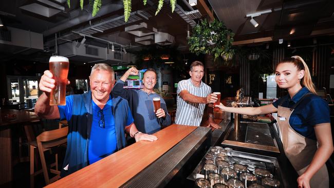 Enjoying a drink at the Broadbeach Tavern served by staff member Claire Smidt-Thompson are, Stephen Bird, Rob Forsyth and Peter Stevenson. Photo: Scott Powick