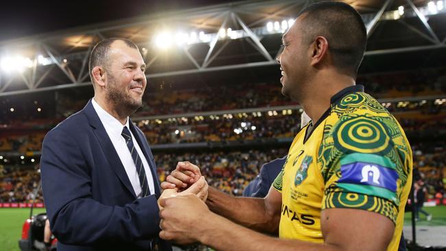 Michael Cheika and Kurtley Beale after beating the All Blacks last year.