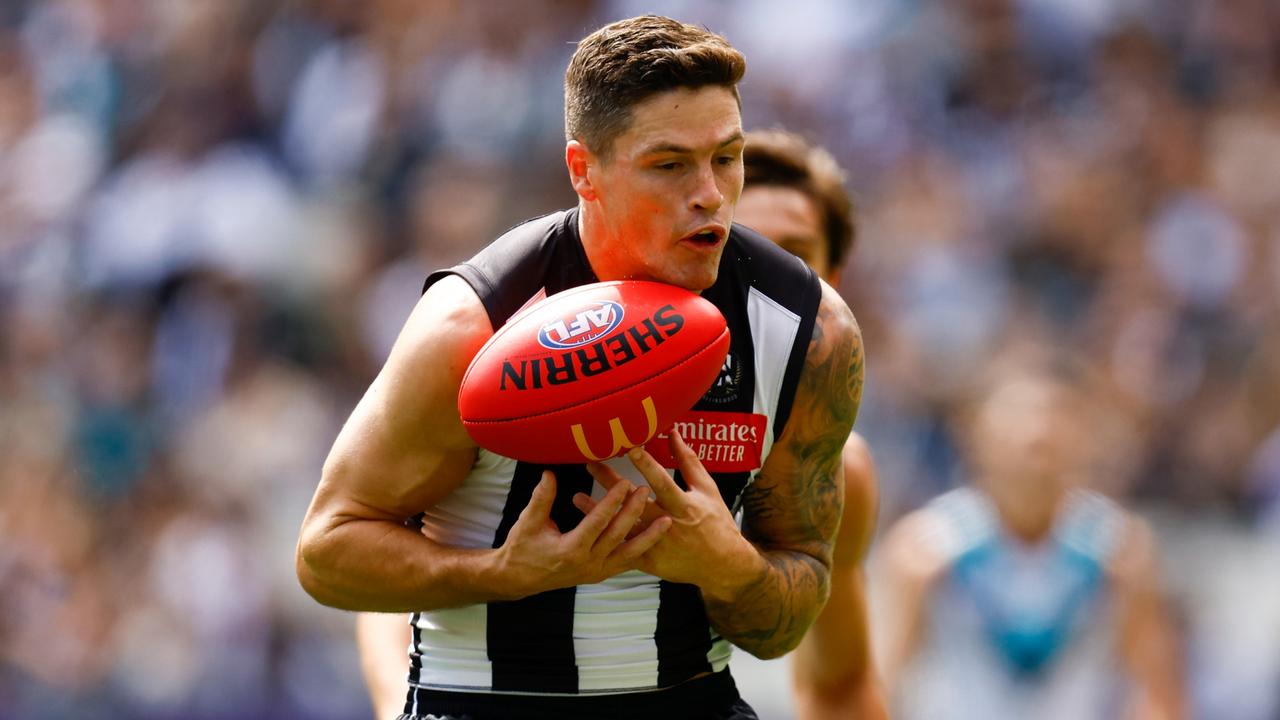 MELBOURNE, AUSTRALIA - MARCH 25: Jack Crisp of the Magpies in action during the 2023 AFL Round 02 match between the Collingwood Magpies and the Port Adelaide Power at the Melbourne Cricket Ground on March 25, 2023 in Melbourne, Australia. (Photo by Michael Willson/AFL Photos via Getty Images)