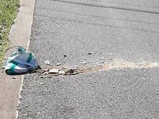 Dangerous asbestos material, hidden in a potting mox bag, dumped in a residential street at Allambie Heights. Picture: NSW Fire &amp; Rescue