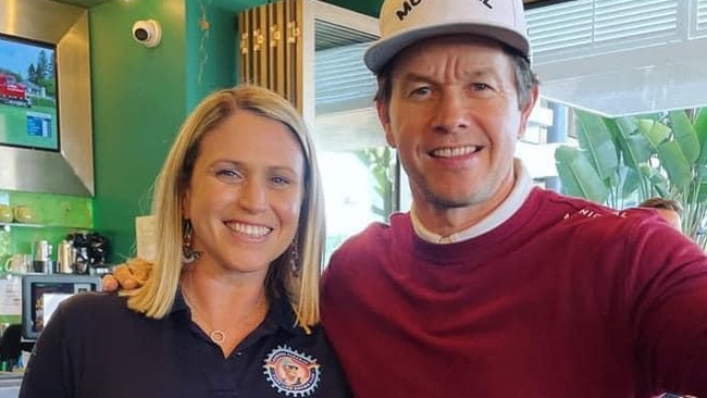 A-lister Mark Wahlberg with the Surfers Paradise Surf Life Saving Club's Breanna Andrews