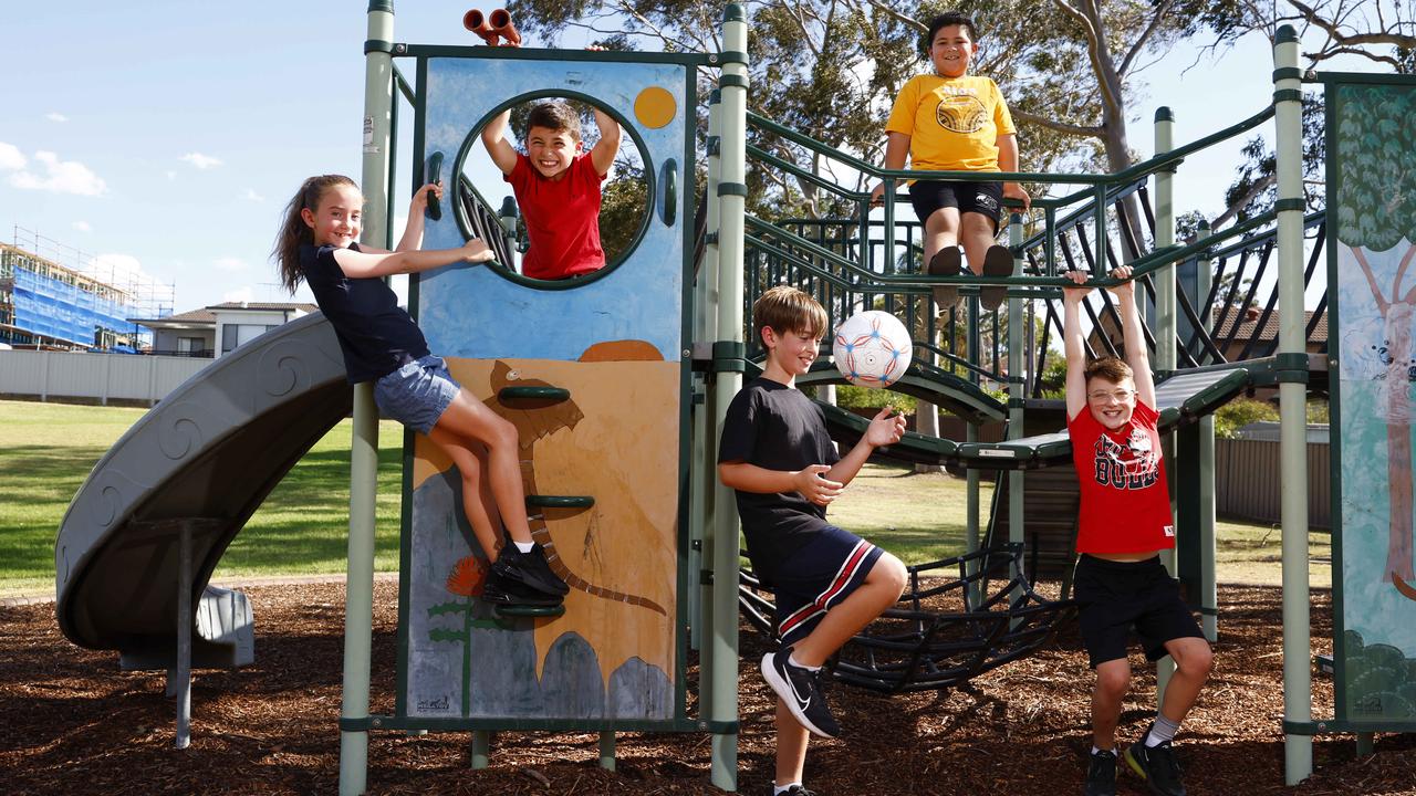 Playing in the park: (from left) Mila Facey, 8, Jakob Saleh, 8, Isaac Facey, 10, Roman Leaupepe, 6, and Samuel Saleh, 11, at Gregory St Reserve in Greystanes. Picture: Jonathan Ng