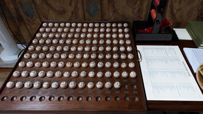 One hundred thirty three balls with numbers corresponding to each cardinal elector are displayed in the Sistine Chapel. Picture: AFP