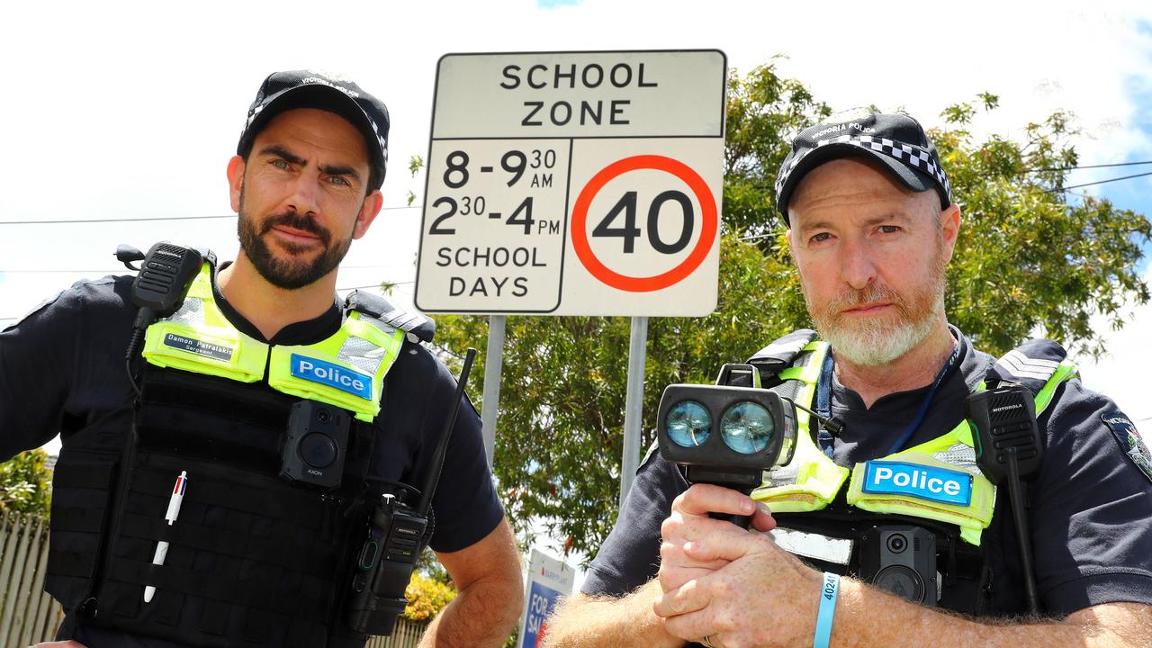 Geelong Highway Patrol Sergeant Damon Patralakis, left, and acting Sergeant Jamie Davidson patrolling 40km/h school zones. Picture: Alison Wynd