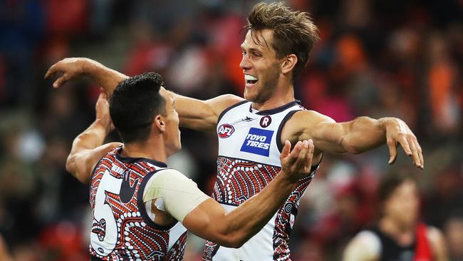 Matt de Boer celebrates a goal with Dylan Shiel. Picture: Phil Hillyard