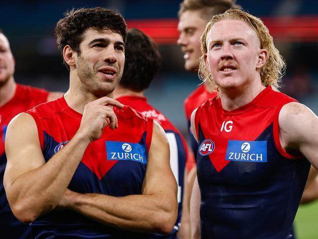 MELBOURNE, AUSTRALIA - APRIL 29: Clayton Oliver and Christian Petracca of the Demons are seen during the 2023 AFL Round 07 match between the Melbourne Demons and the North Melbourne Kangaroos at the Melbourne Cricket Ground on April 29, 2023 in Melbourne, Australia. (Photo by Dylan Burns/AFL Photos via Getty Images)