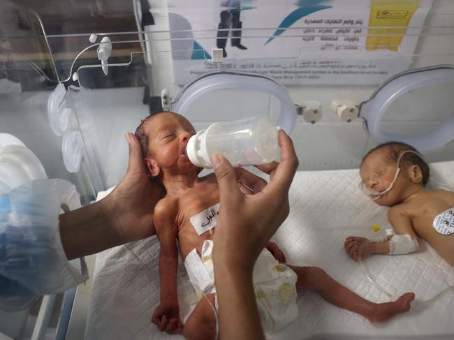 A Palestinian medic cares for babies born preterm amid the ongoing conflict between Israel and the Hamas movement, at the Emirati hospital in Rafah in the southern Gaza Strip. Picture: AFP