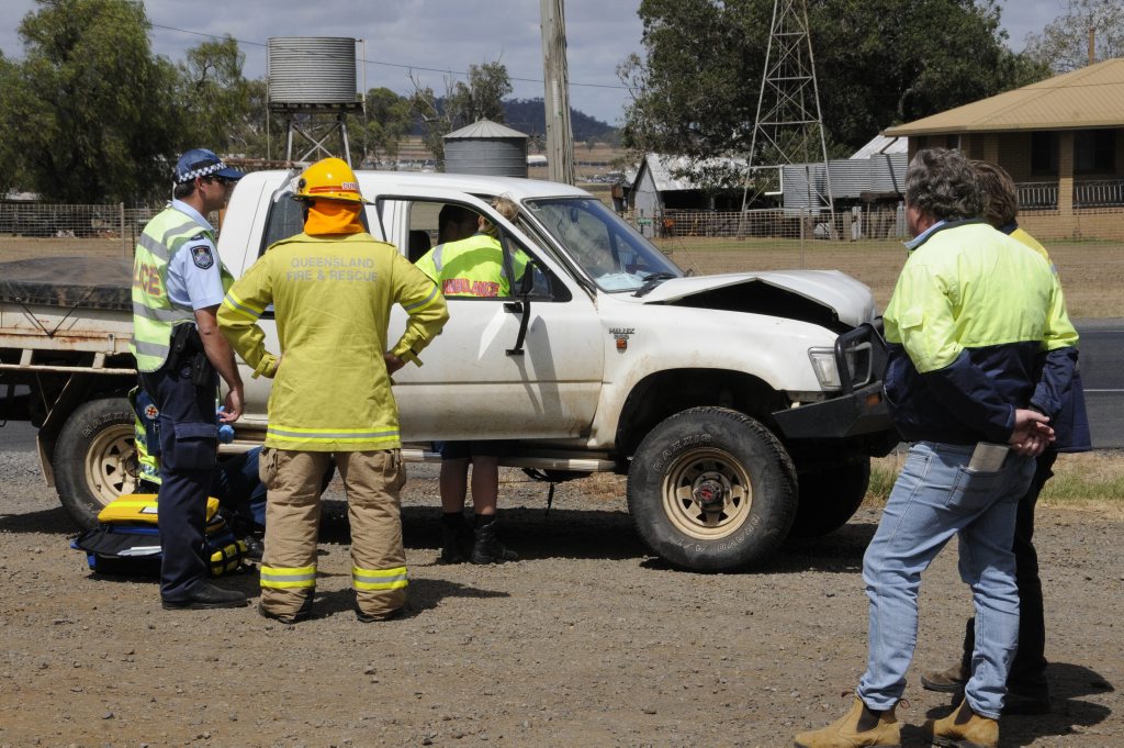 Emergency services at the scene of a two-vehicle crash on the Warrego Hwy. Picture: Bev Lacey