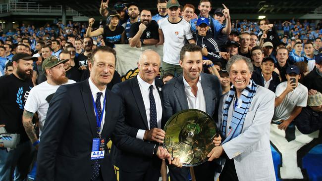 Tony Pignata, Graham Arnold, Coach of Sydney FC with Scott Barlow and David Traktovenko.
