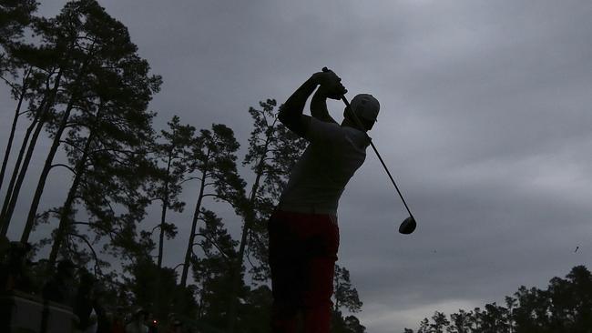 Sergio Garcia tees off on the 14th hole beneath a stormy sky just before play was suspended during practice for the Masters golf tournament at Augusta National Golf Club, Wednesday, April 5, 2017, in Augusta, Ga. (Curtis Compton/Atlanta Journal-Constitution via AP)