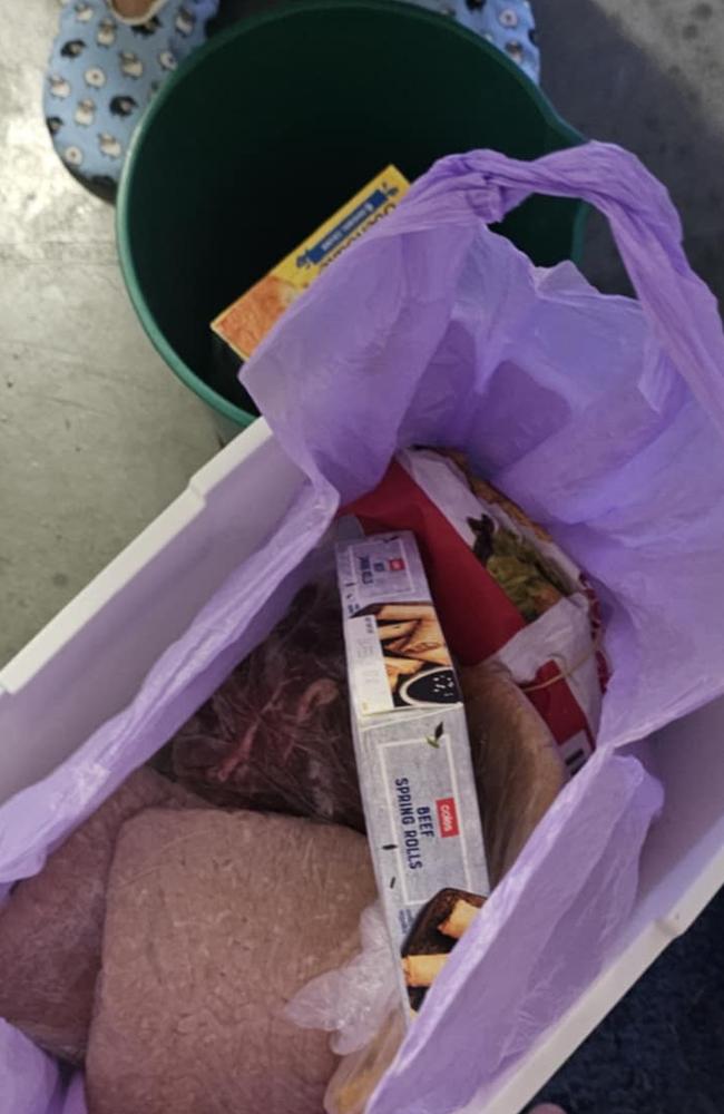 Bins were filled with unused groceries as hundreds of thousands of Gold Coasters lost the ability to refrigerate. Picture: Tyran Holmes.