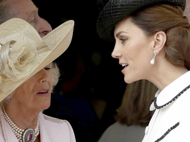 From left, Queen Letizia of Spain, Camilla, Duchess of Cornwall and Kate, Duchess of Cambridge, stand together as they watch the annual Order of the Garter Service at St George's Chapel, Windsor Castle in Windsor, England, Monday, June 17, 2019. (Steve Parsons/Pool Photo via AP)