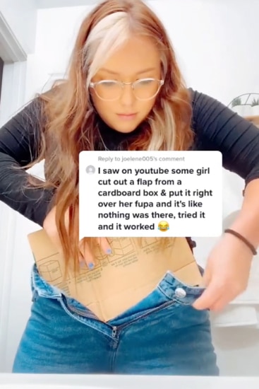 Mum uses piece of cardboard to create a 'flat tummy' in viral