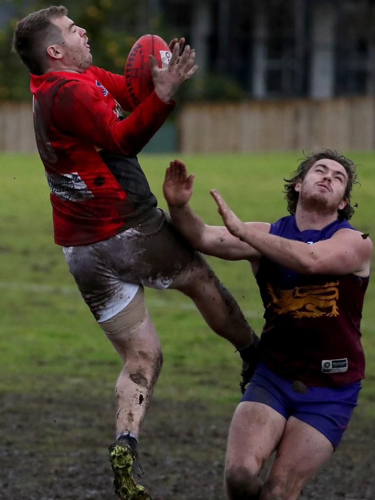 South Yarra and Hallam do battle in the mud in Southern Football League Division 4.