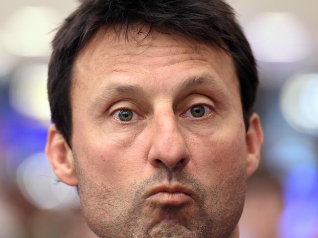 New South Wales State of Origin coach Laurie Daley answers a question after arriving at the domestic airport in Sydney on Thursday, June 23, 2016. The Queensland Maroons defeated the NSW Blues in the second match of the three match series in Brisbane on Wednesday. (AAP Image/Paul Miller) NO ARCHIVING