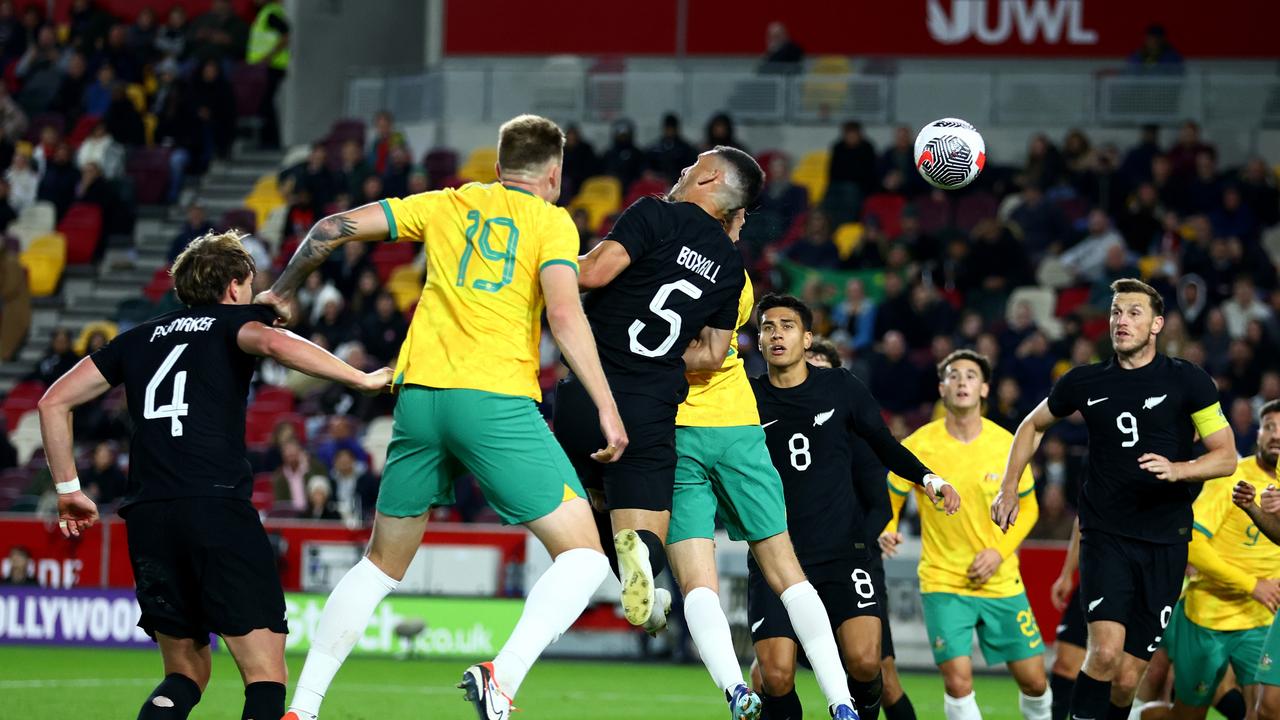 Jackson Irvine of Australia (obscured) scores the team's second goal. Photo by Bryn Lennon/Getty Images.