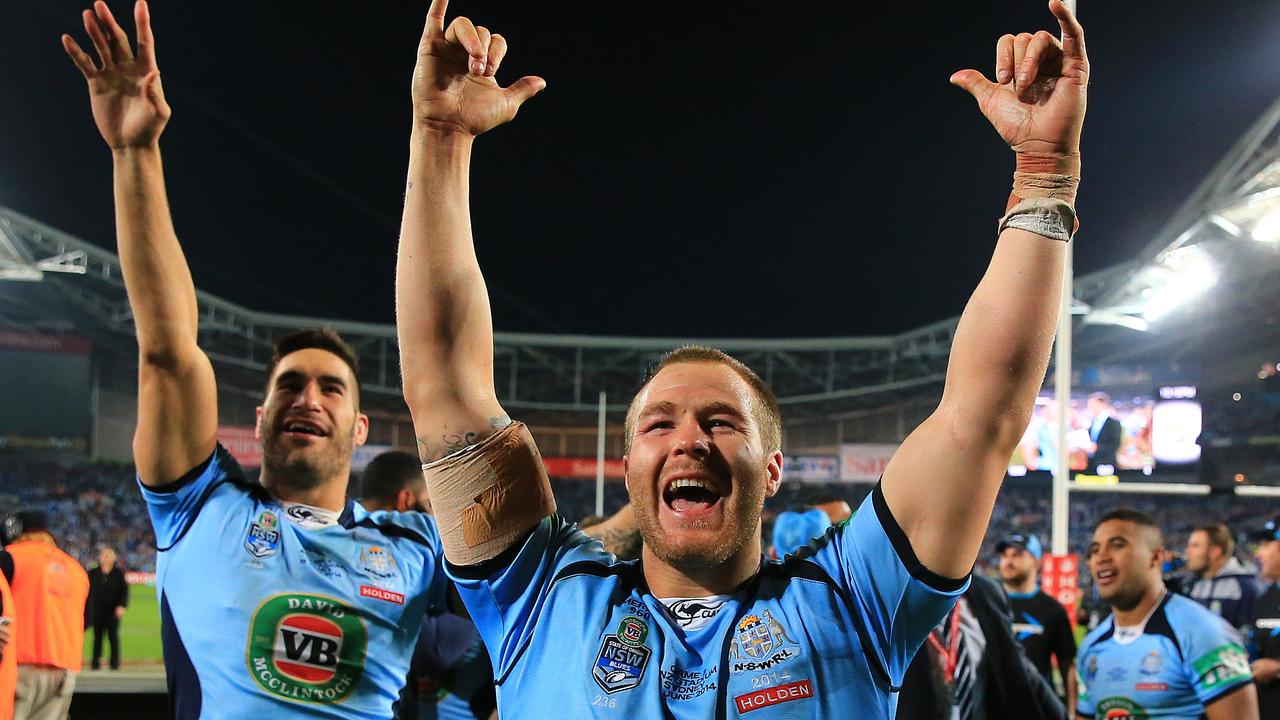 Trent Merrin and James Tamou celebrate NSW series win during State of Origin 2 between NSW and Queensland at ANZ Stadium, Homebush. pic Mark Evans