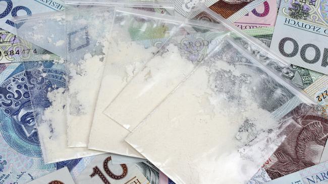 A Sunshine Coast woman facing more than 60 charges, including drug dealing and trafficking, allegedly hid a stash of cash and drugs in her bra after being pulled over by police.