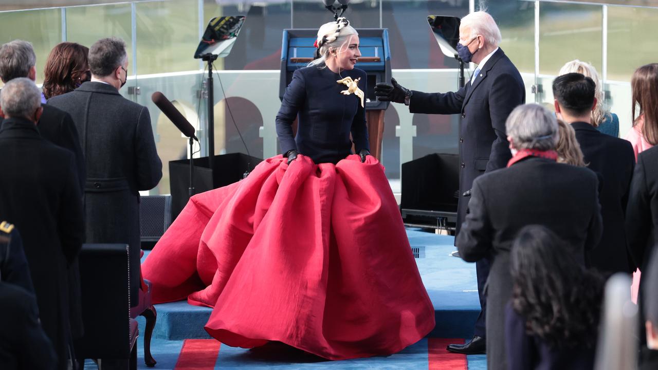 Lady Gaga talks with Joe Biden ahead of his inauguration. Picture: Getty Images