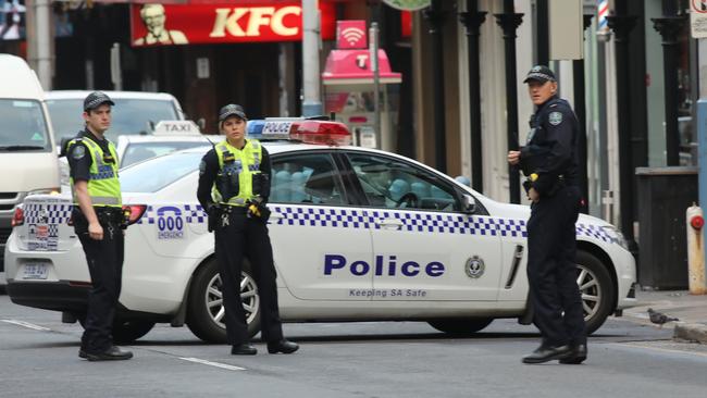 Police officers on duty on Hindley St. Picture: AAP / Dean Martin