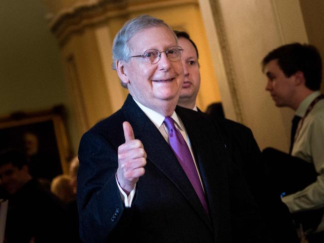 Republican senate majority leader Mitch McConnell pleased after the senate votes to fund the US government. Picture: AFP/Brendan Smialowski