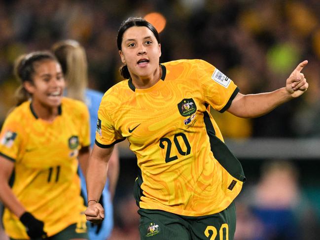 FILES-- This file photo taken on August 16, 2023 shows Australia's forward Sam Kerr celebrating scoring her team's first goal during the Australia and New Zealand 2023 Women's World Cup semi-final football match between Australia and England at Stadium Australia in Sydney. Chelsea and Australian women's football star Sam Kerr has been charged with a 