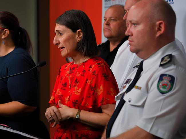 NSW Premier Gladys Berejiklian speaks to the media alongside RFS Commissioner Shane Fitzsimmons during a press conference at RFS Headquarters in Sydney on Thursday. Picture: AAP