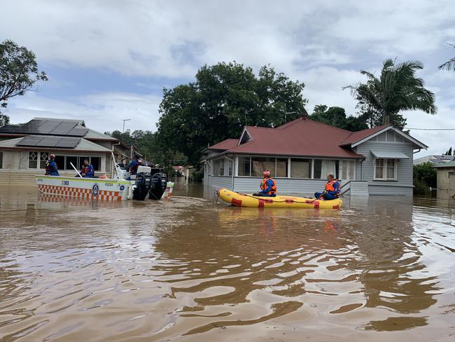 SES crews inspect homes on Ewing St on March 1, 2022. Picture: Stuart Cumming