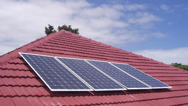 HOMES A generic photo of house with solar panels on roof.