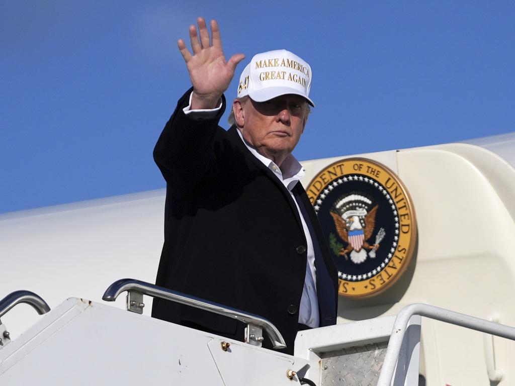 President Donald Trump waves as he boards Air Force One at Morristown Municipal Airport, N.J. Picture: AP