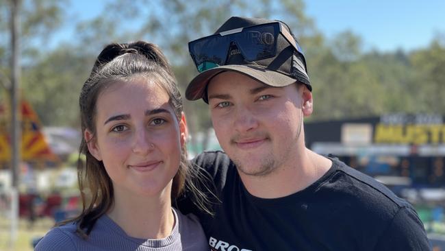 Mackenzie Howell and Josh Ikin, from Coffs Harbour, enjoy day one of the 2024 Gympie Muster, at the Amamoor State Forest on August 22, 2024.