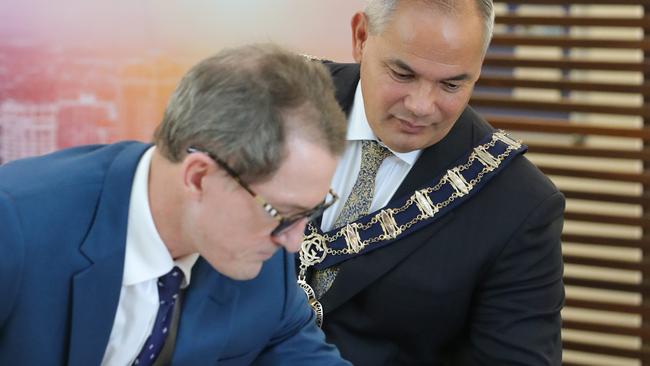 Mayor Tom Tate at Evandale, being sworn in by CEO Dale Dixon as Gold Coast Mayor for a third term. Picture: Glenn Hampson