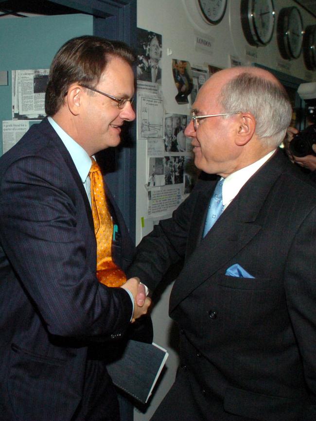 Former Prime Minister John Howard and ill-fated Opposition Leader Mark Latham cross paths in a fateful confrontation at the ABC radio studios in Sydney. Picture: John Feder