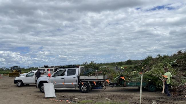 Residents unload green waste at the Rockhampton landfill.
