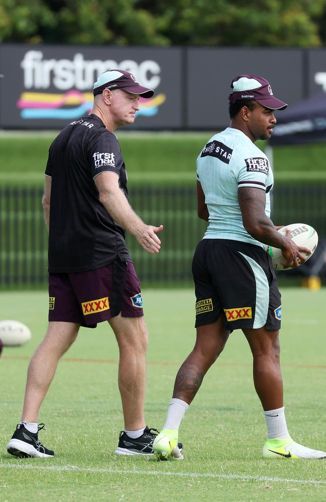 Maguire talks with Ezra Mam during a training session. Picture: Liam Kidston