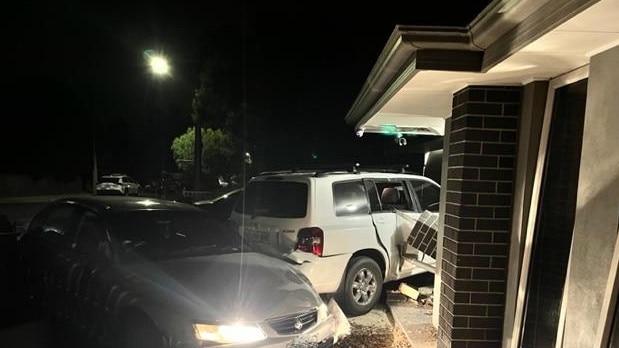 A 21-year-old man from Andrews Farm holding a provisional license hit a parked car and smashed into a house in Davoren Park just after 12am on Saturday. Picture: SA Police