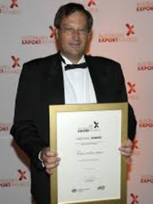 Maurice Van Ryn at an awards ceremony.