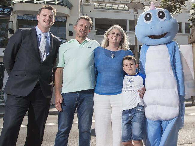 Northern Beaches Mayor Michael Regan (left) with the McLaughlins and the Little Blue Dinosaur at Manly. Picture: Troy Snook