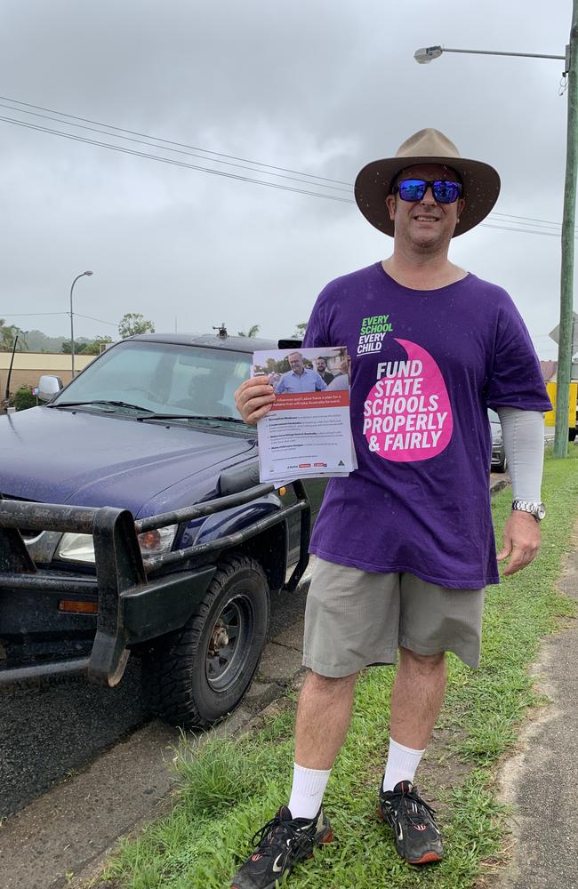 Volunteer Tom Petitt outside St Luke's Hall in Sarina in the Capricornia electorate. Mr Petitt was handing out how to vote cards for Labor's Russell Robertson. Federal election 2022. Picture: Duncan Evans