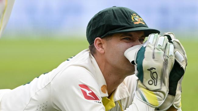 Alex Carey reacts after dropping Harry Brook. (Photo by Stu Forster/Getty Images)