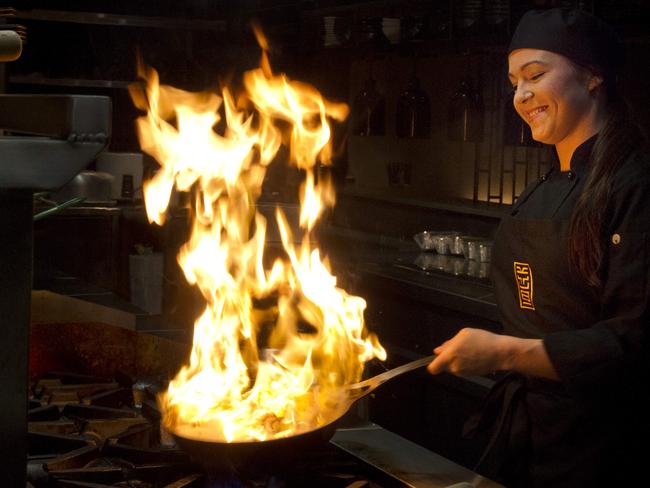 Katey Shaw who graduated from her apprenticeship with HTN in 2014 and is now the President of the Australian Culinary FederationÕs Young Chefs Club. Katey pictured in the kitchen of Kyubi, The Catholic Club, Campbelltown. Pic Jenny Evans
