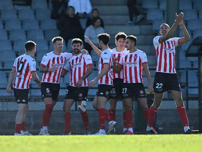 Caroline Springs George Cross celebrate a goal. Picture: Mark Avellino