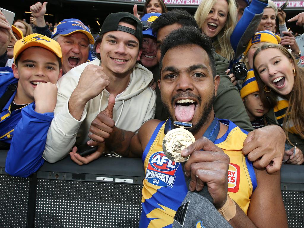 Willie with cousin Daniel after West Coast’s 2018 grand final win. Picture: Michael Klein