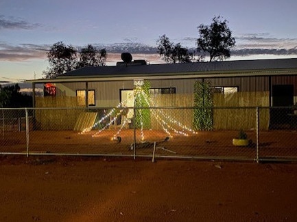 A remote community Christmas light competition is underway in the Red Centre remote communities of Finke and Santa Teresa, December 2024. One of the participating homes in Finke. Picture: Supplied