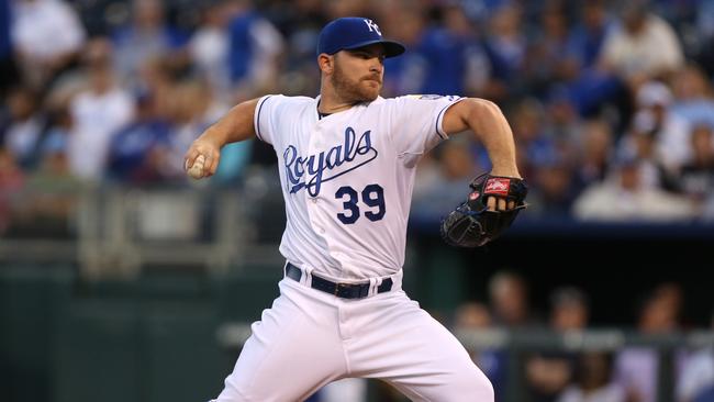 KANSAS CITY, MO - SEPTEMBER 16: Liam Hendriks #39 of the Kansas City Royals throws in the first inning during a game against the Chicago White Sox at Kauffman Stadium on September 16, 2012 in Kansas City, Missouri. (Photo by Ed Zurga/Getty Images)