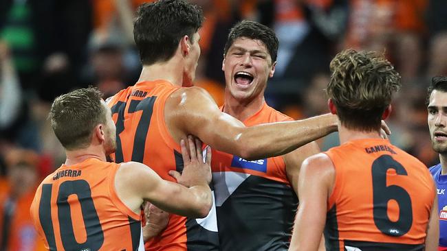 Giants Jonathon Patton celebrates goal by Rory Lobb during AFL Preliminary Final match GWS Giants v Western Bulldogs at Spotless Stadium. Picture. Phil Hillyard